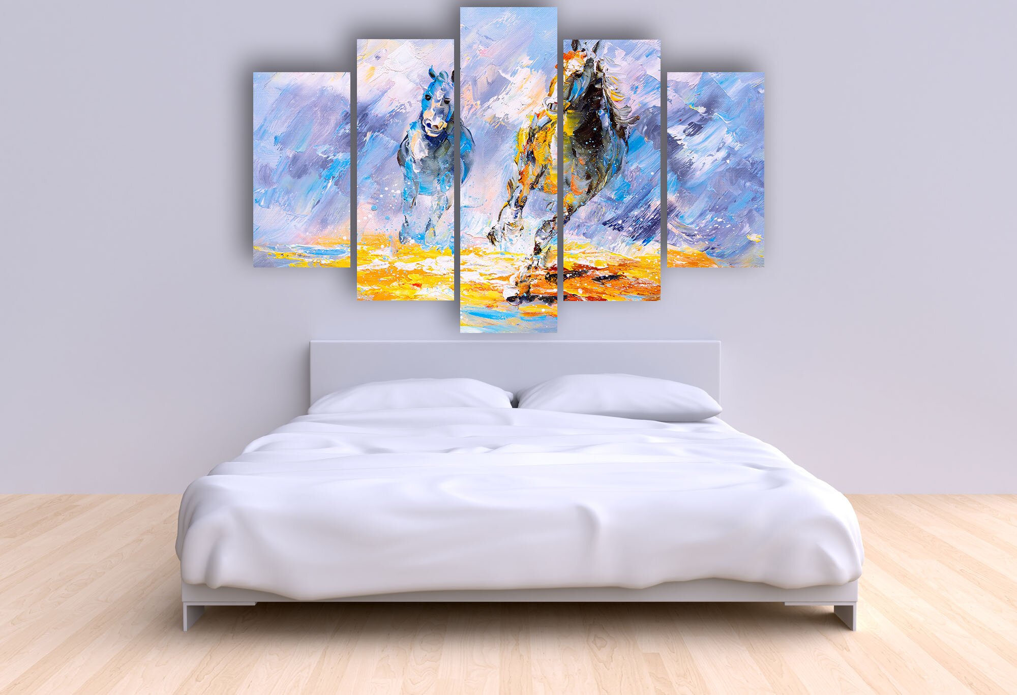 Modern bed with two pillows and a blanket against the wall of th